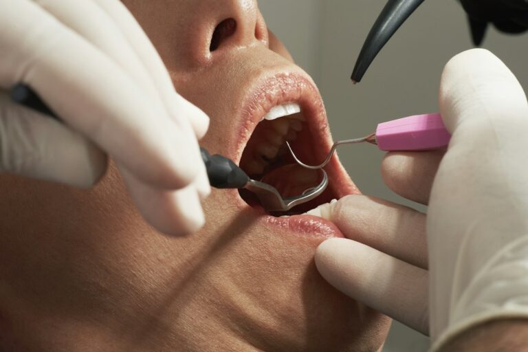 Illustrative image of a tooth and gum examination.